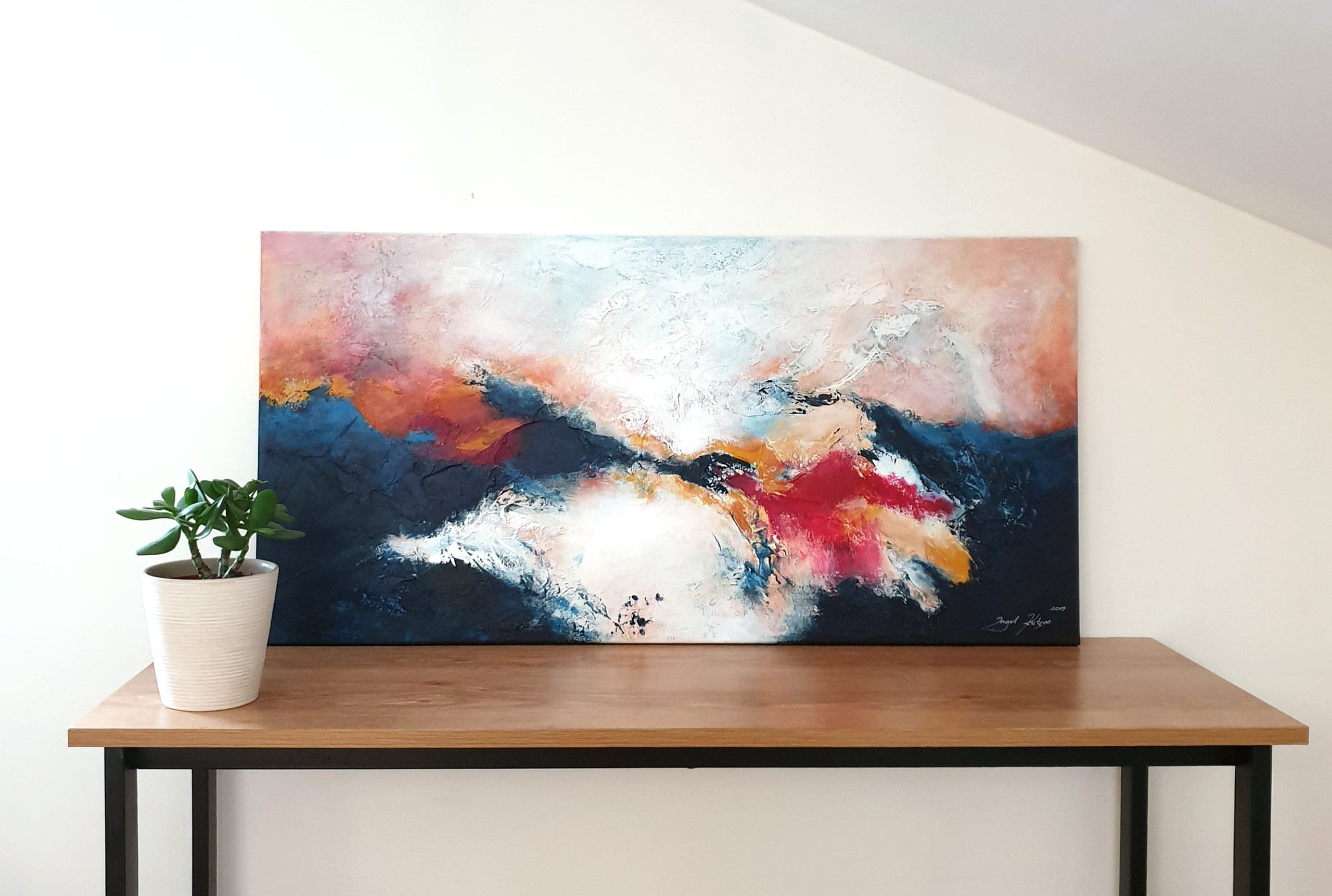 Textured abstract painting in a modern living room