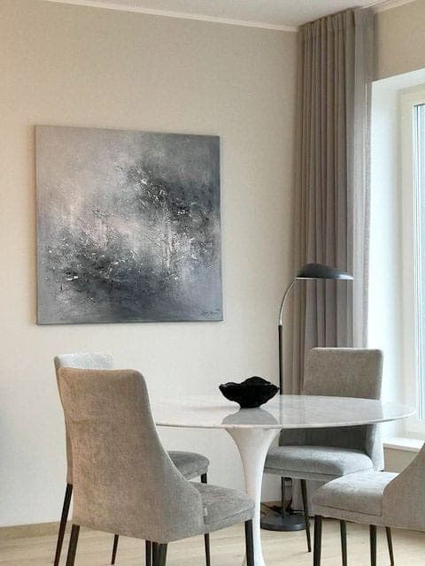 Ingel Kutsar's abstract original painting "Glimmering memory" on the wall in an interior