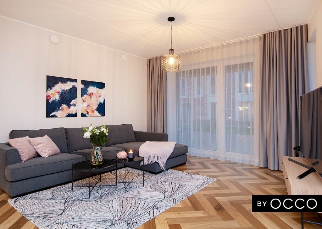 Ingel Kutsar's abstract original painting "Interior design by OCCO" on the wall in an interior