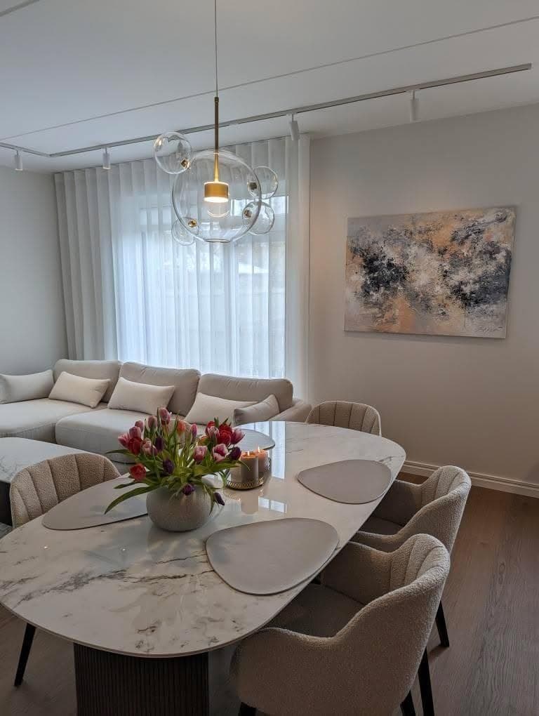 Ingel Kutsar's abstract original painting "Fulfillment" on the wall in an interior