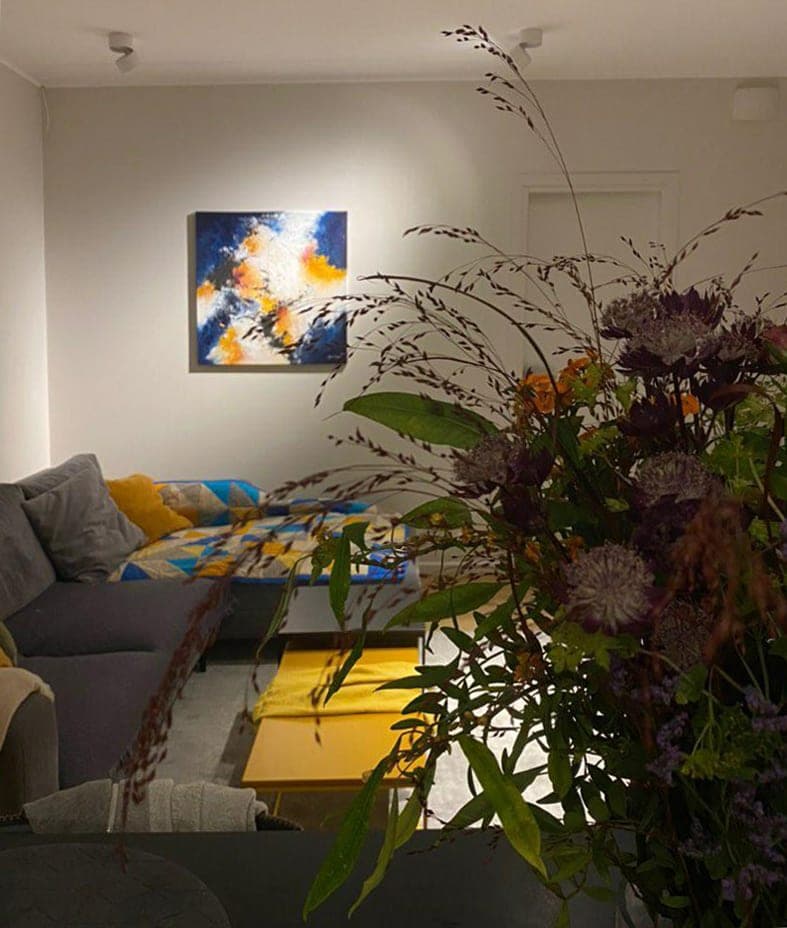 Ingel Kutsar's abstract original painting "Dance of feelings" on the wall in an interior
