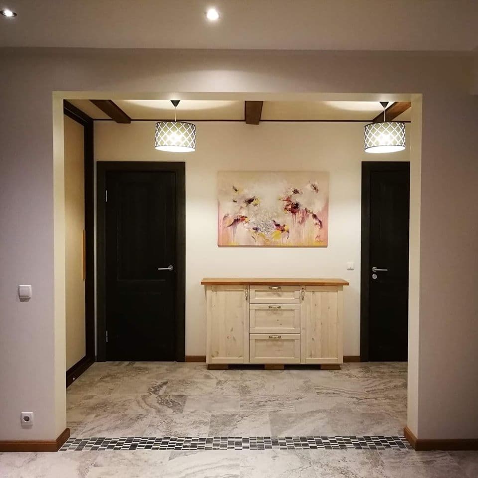 Ingel Kutsar's abstract original painting "Rebirth" on the wall in an interior