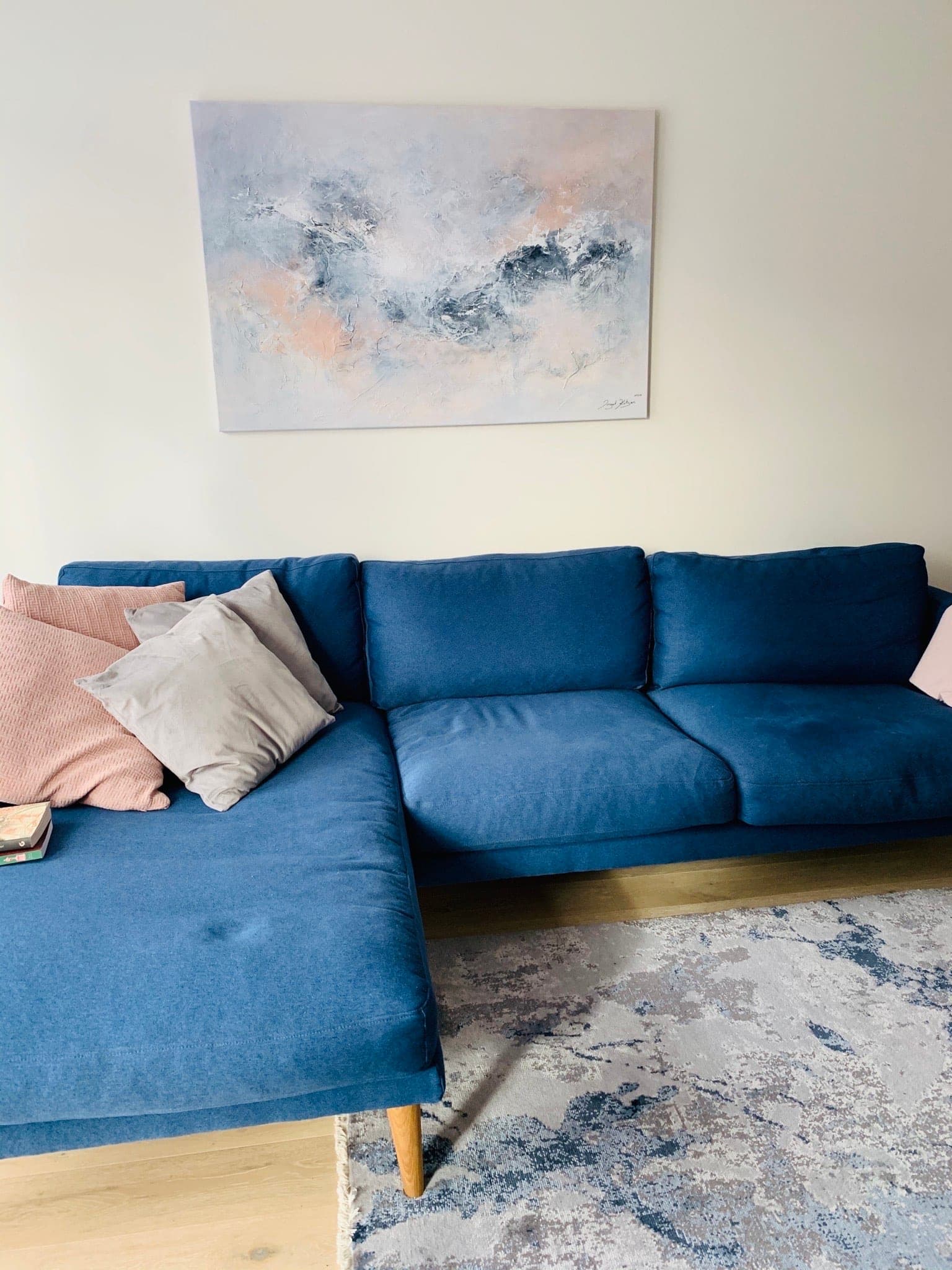 Ingel Kutsar's abstract original painting "Together forever" on the wall in an interior
