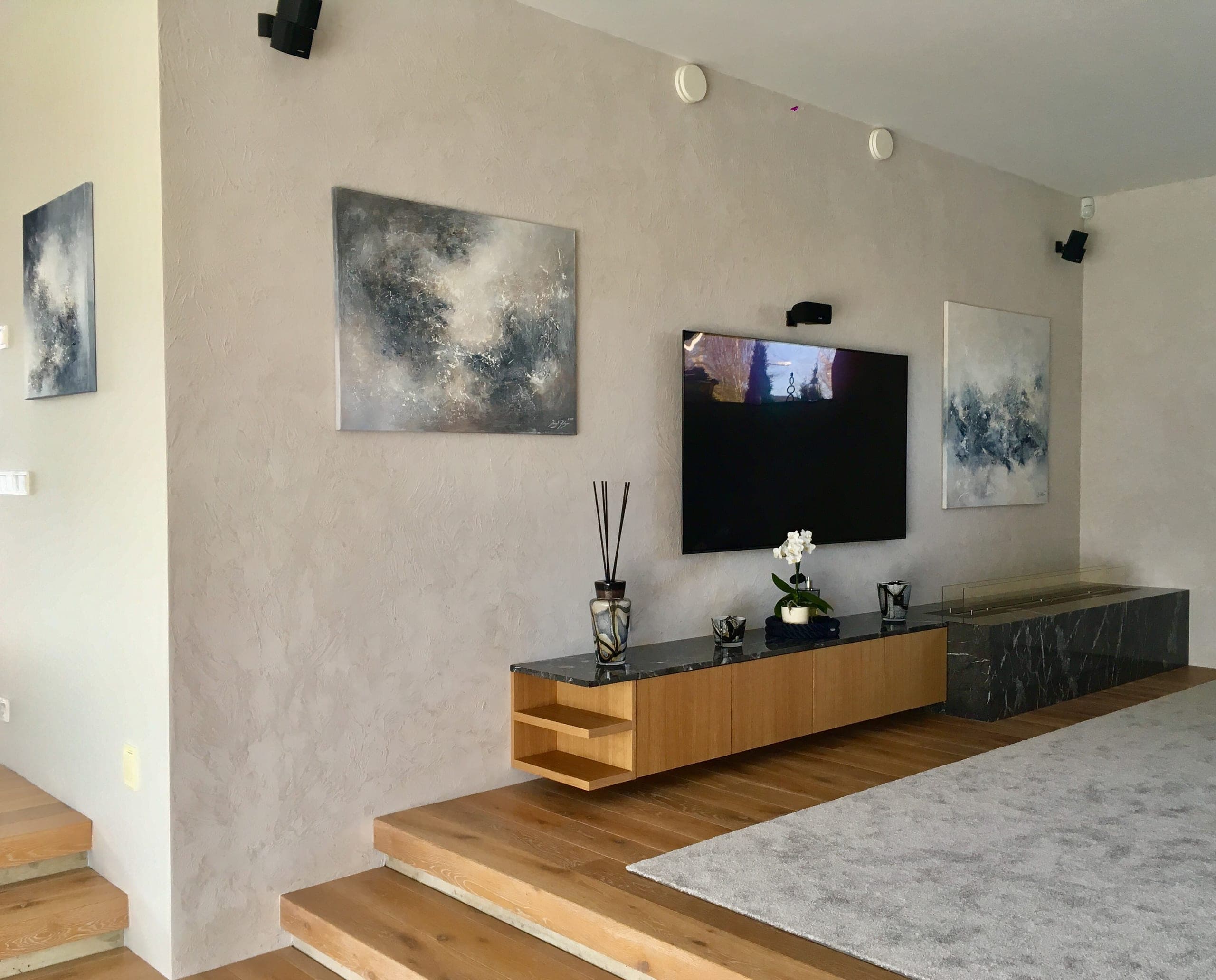 Ingel Kutsar's abstract original painting "In the haze, Frost, Come closer" on the wall in an interior